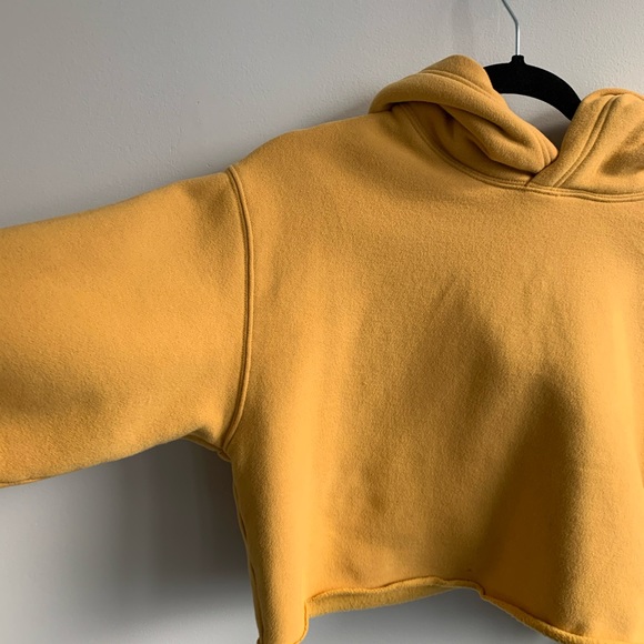 Aritzia Sweaters - TNA Cropped Mustard Hoodie